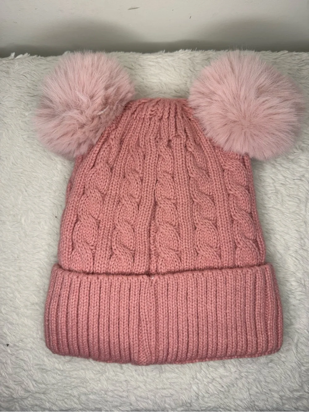 UGG Kids Blush Pink Cable Knit Hat with Dual Faux-Fur Poms